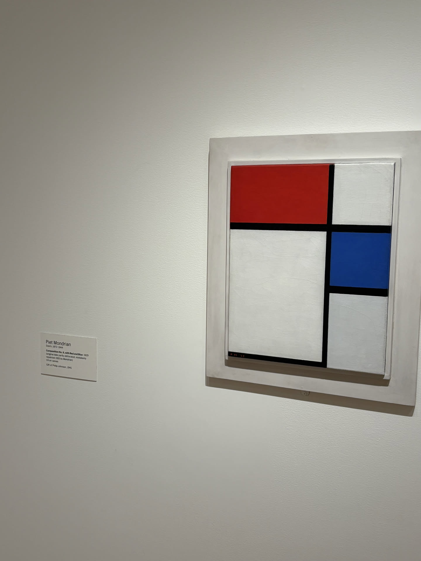 Piet Mondrian's Composition with Red, Blue, Black, Yellow, and Gray displayed at MoMA